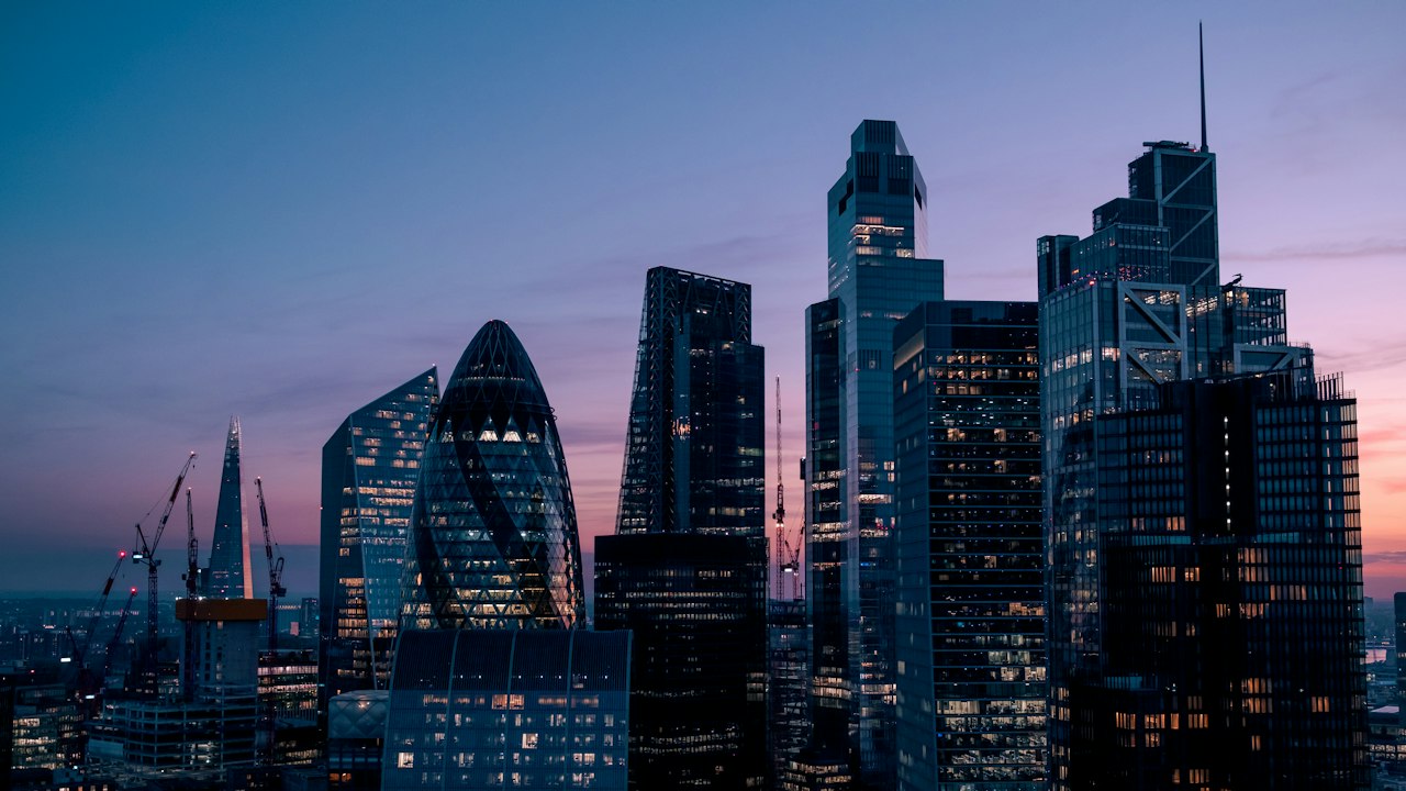 a view of the city of london at dusk