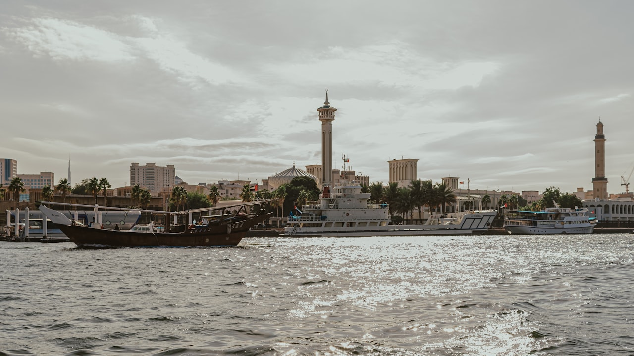 A large body of water with a city in the background