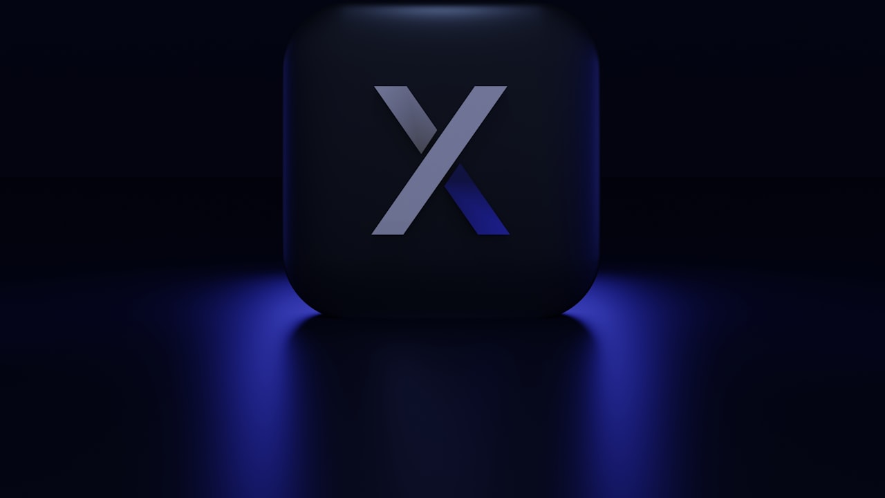 a blue square with a white letter on it
