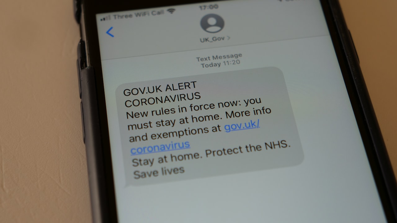 a cell phone with a text message on the screen