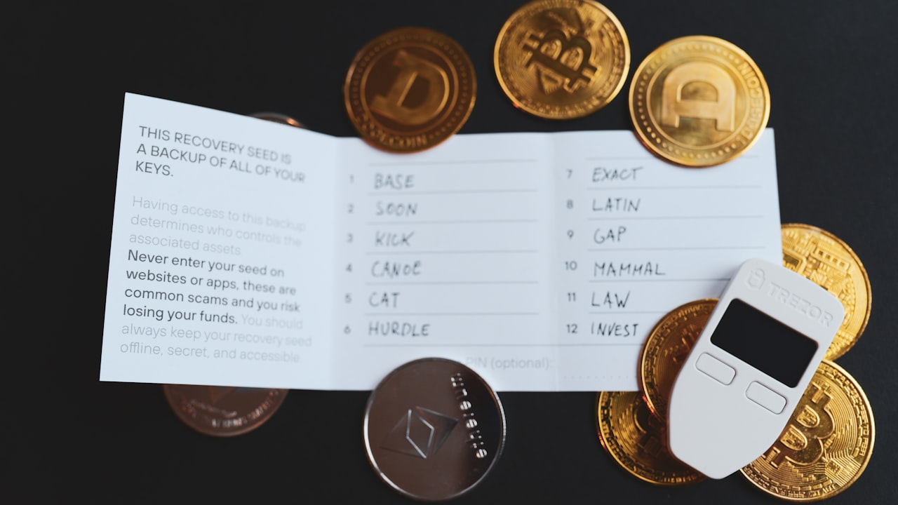 a cell phone sitting on top of a pile of coins