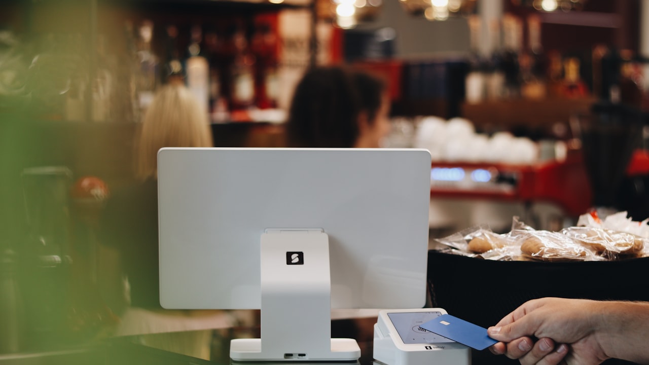 A person sitting at a desk in front of a computer