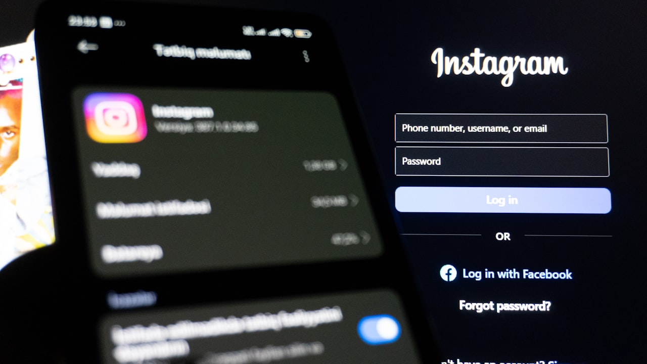 Instagram app on phone and login screen.