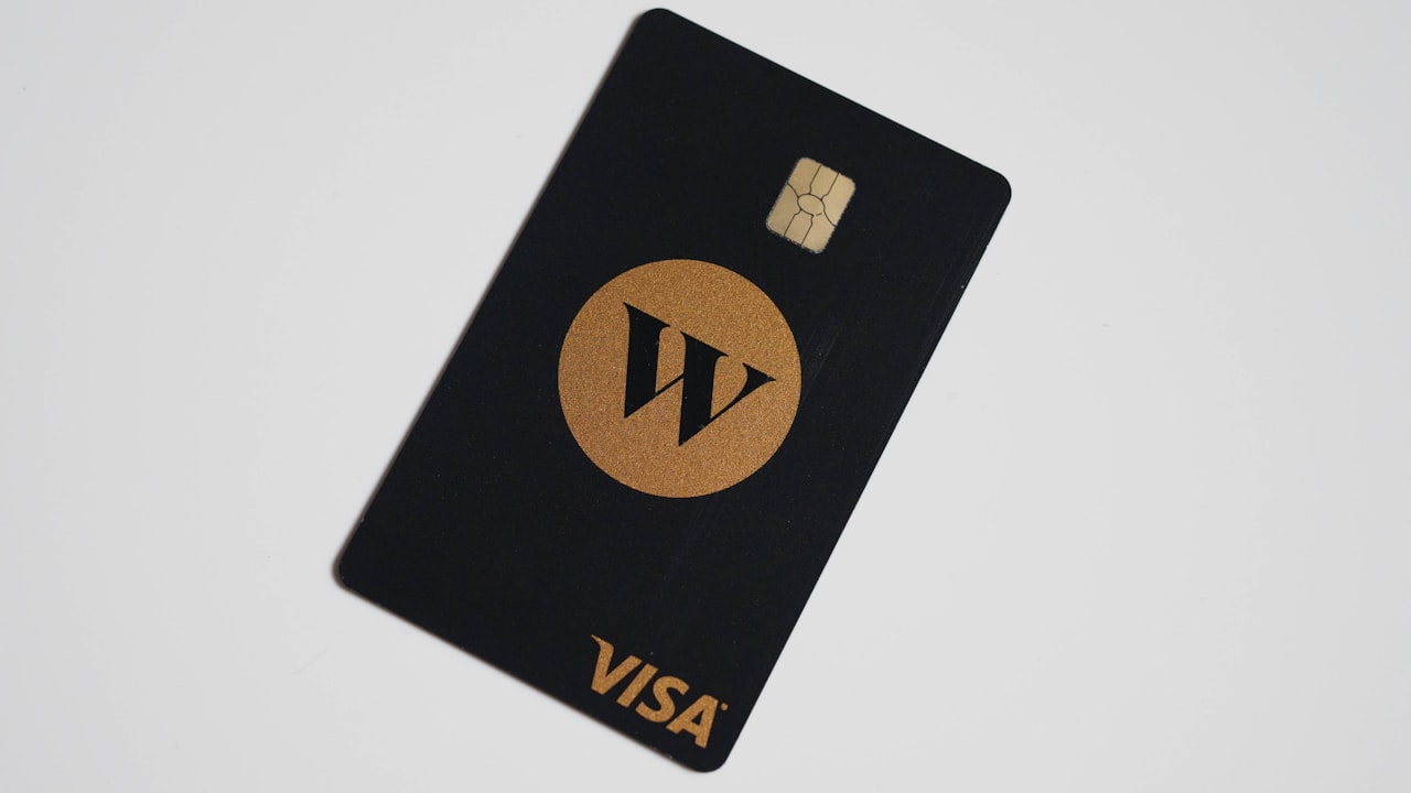 a visa card sitting on top of a white table