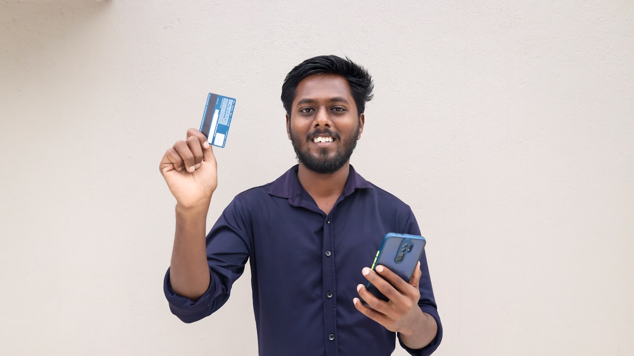 a man holding a phone